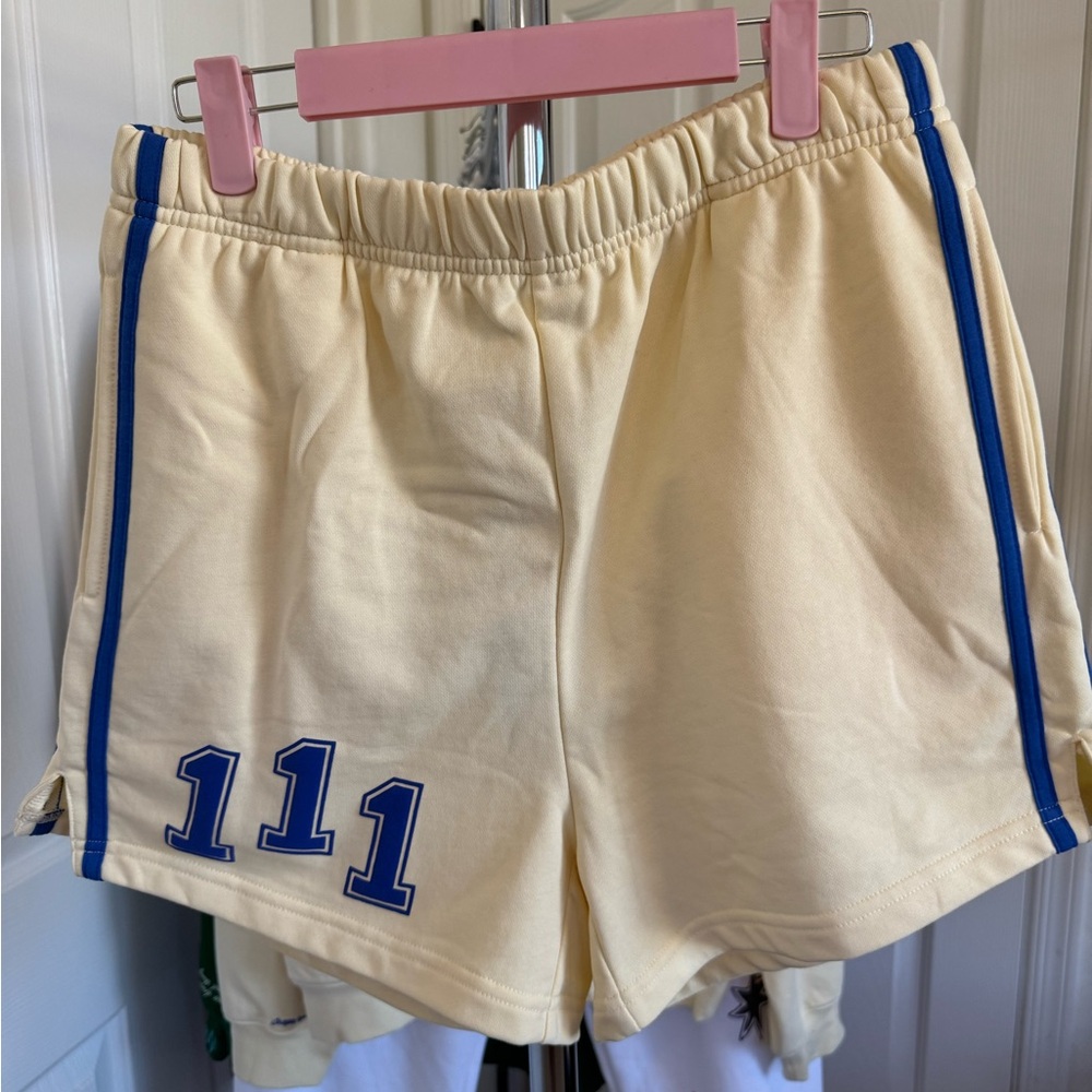 Women's Cream Athletic Shorts with Blue Trim